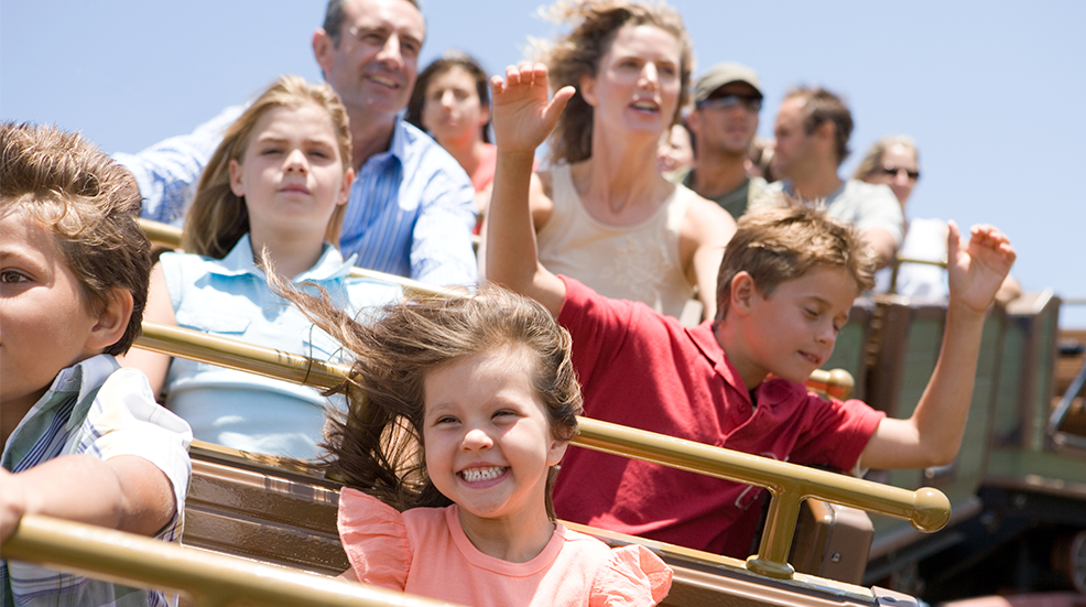 Family riding a rollercoaster